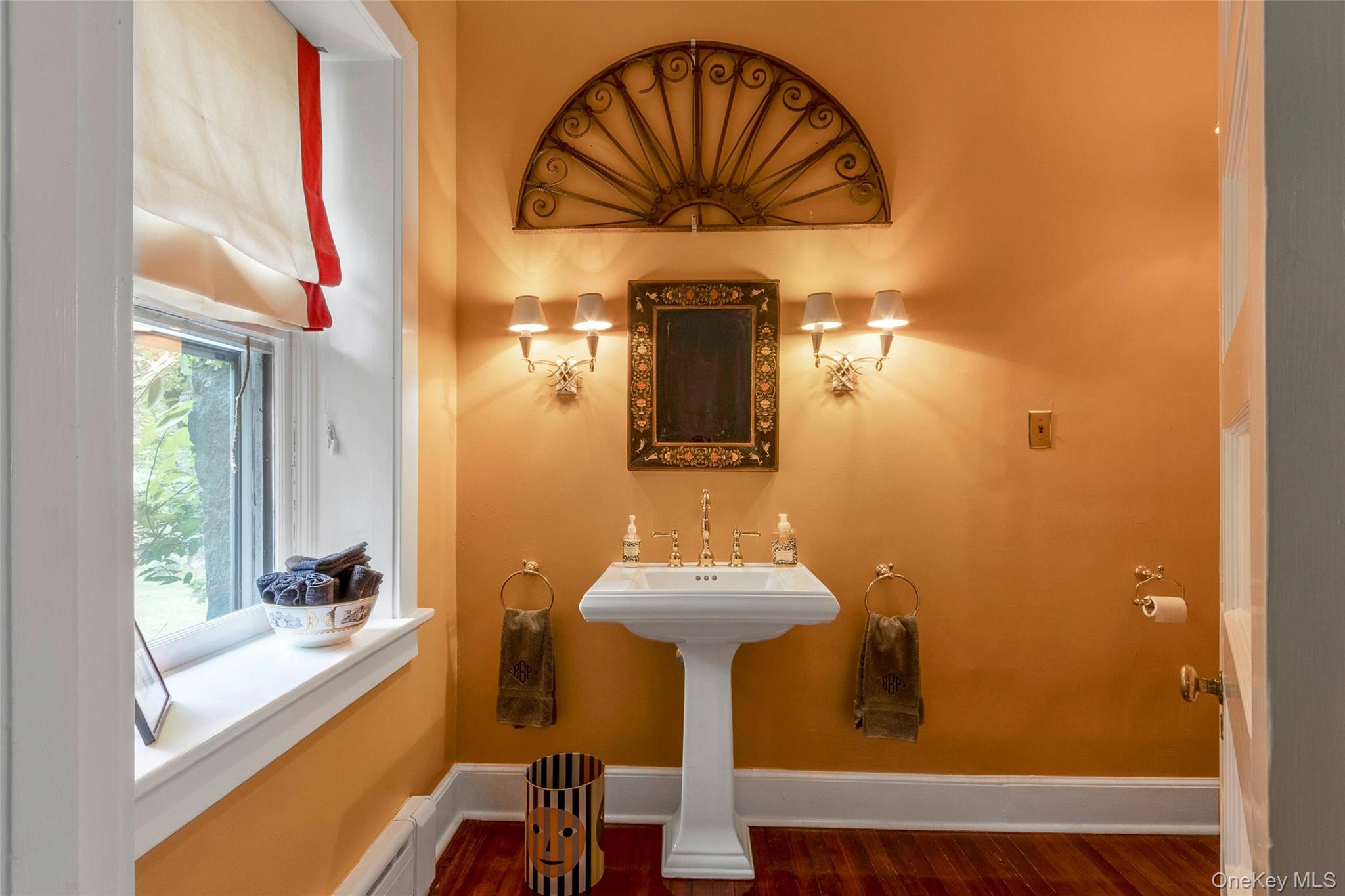 55 Mountain Farm Road Tuxedo Park, NY 10987 - Photo 25 of 42 a bathroom with a sink and a mirror