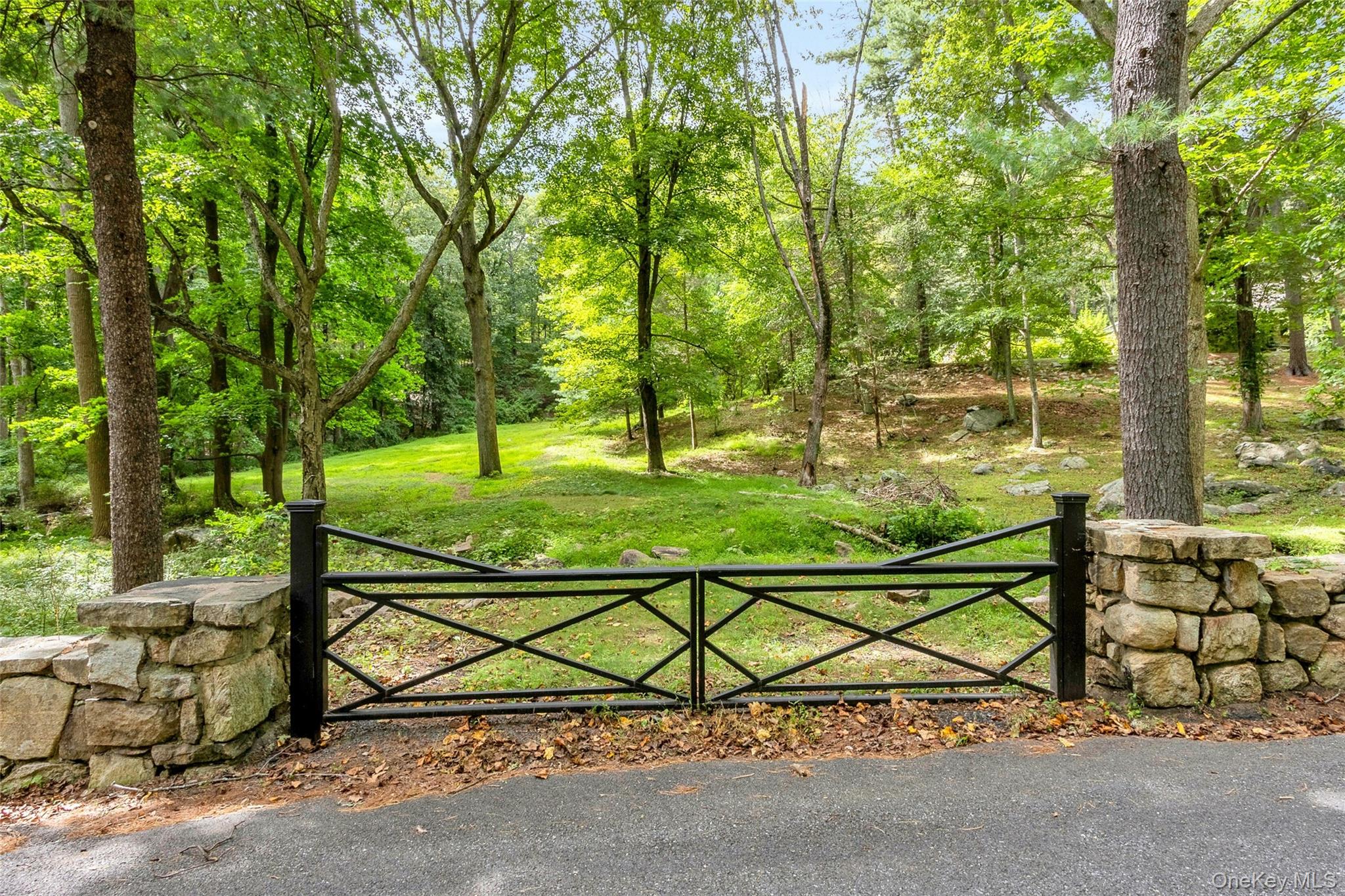 55 Mountain Farm Road Tuxedo Park, NY 10987 - Photo 35 of 42 a view of outdoor space with deck and garden