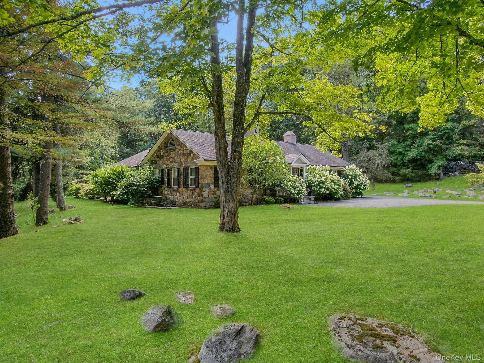 55 Mountain Farm Road Tuxedo Park, NY 10987 - Photo 39 of 42 a view of a house with a backyard