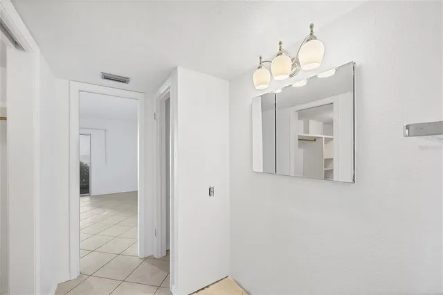 a view of a swimming pool with outdoor seating