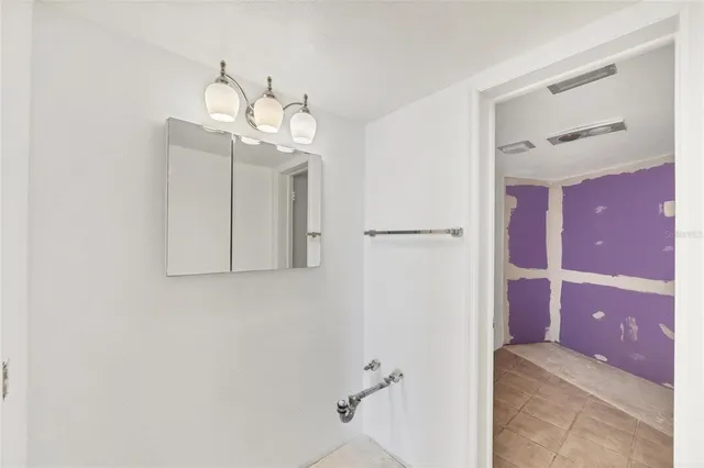 a front view of a building with retail shops