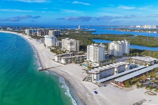 a view of a city with lawn chairs