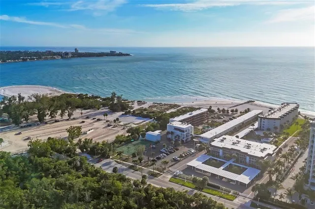a view of a double vanity sink and outdoor seating