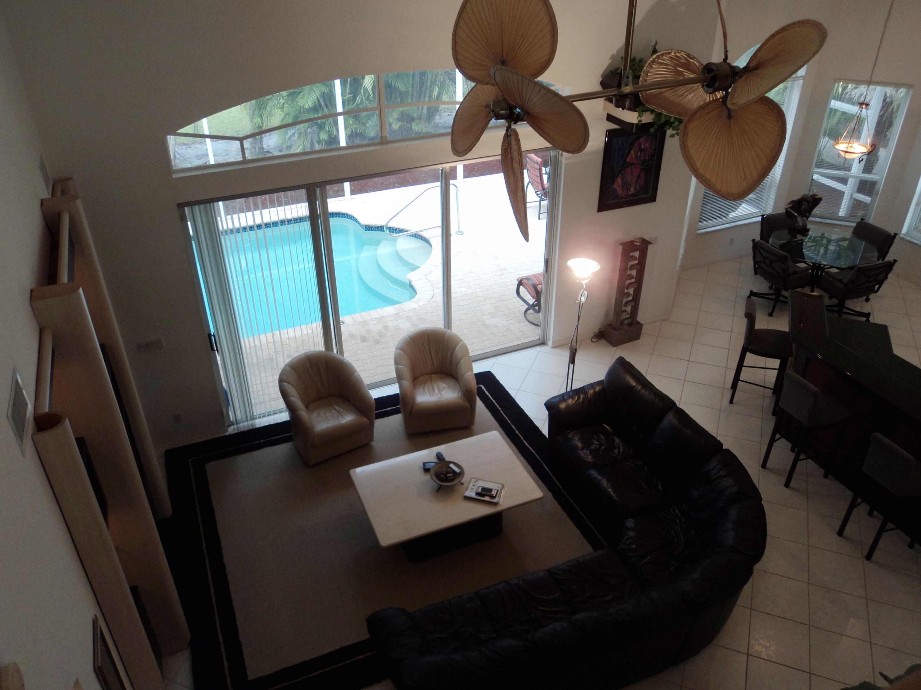 22205 Cressmont Place Boca Raton, FL 33428 - Photo 20 of 36 View of Fam Rm & Pool from Loft