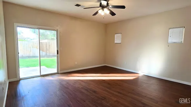 a bathroom with a double vanity sink and mirror
