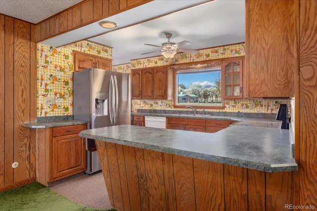 a view of a sink and a window