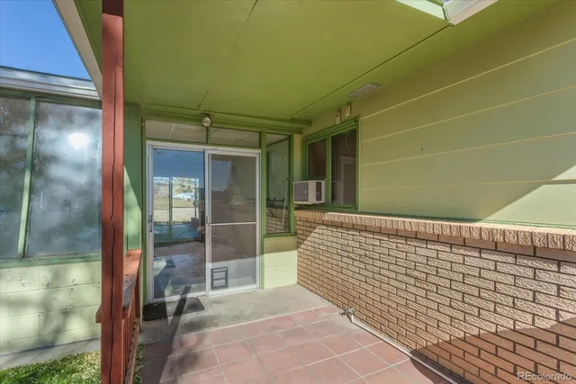 a view of front door with stairs