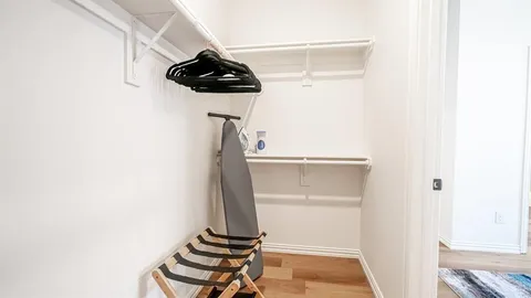 a view of entryway with wooden floor