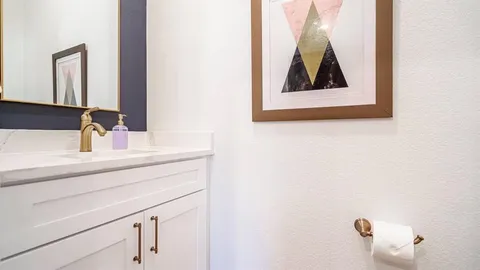 a close view of a sink and mirror
