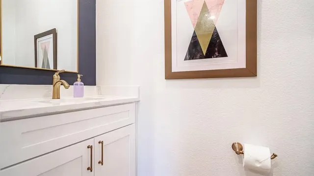 a close view of a sink and mirror