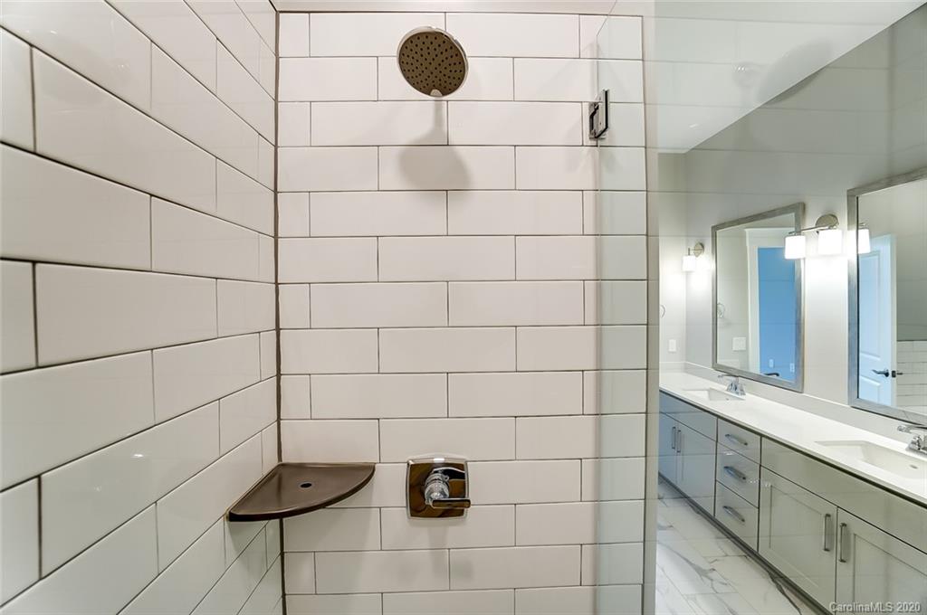830 Providence Road, Unit 303 Charlotte, NC 28207 - Photo 29 of 39 a bathroom with a shower