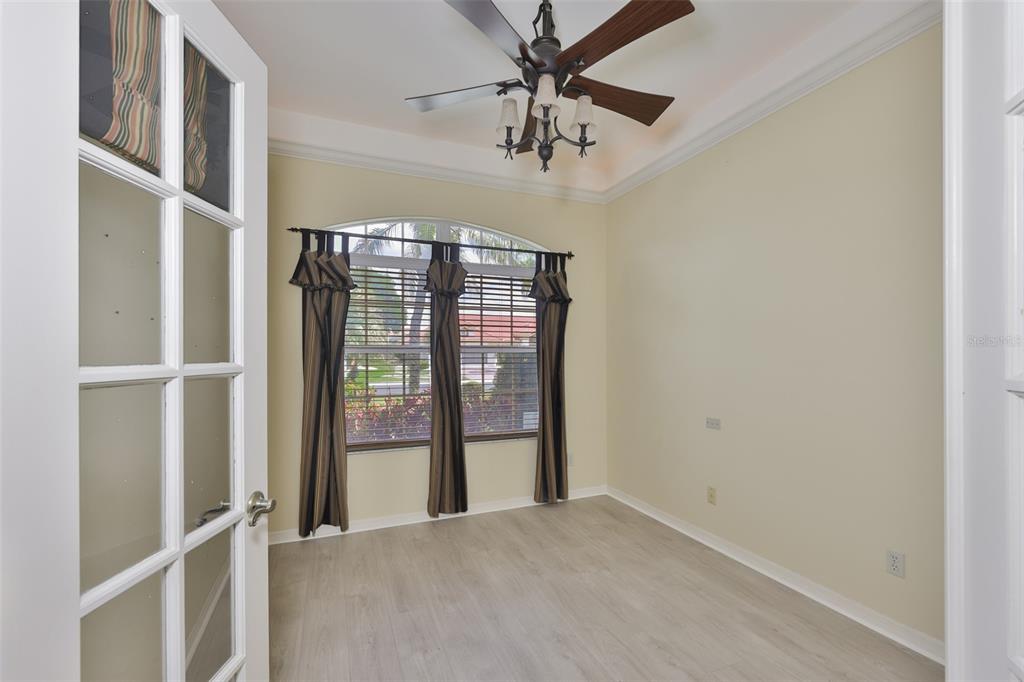 1107 Opal Lane Sun City Center, FL 33573 - Photo 13 of 72 a view of an empty room with a window
