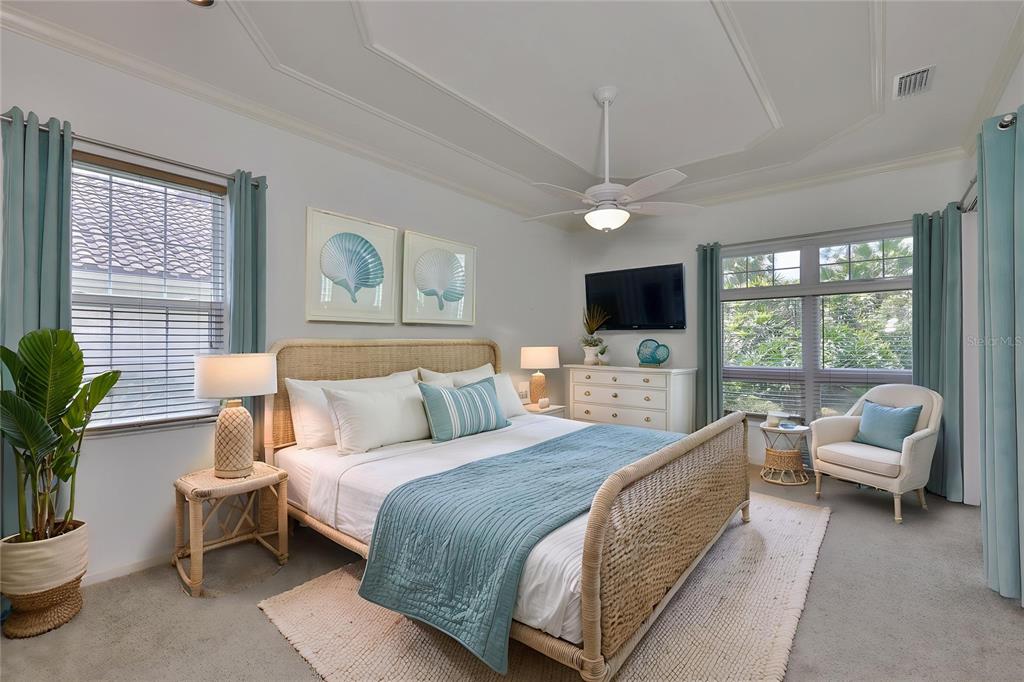 1107 Opal Lane Sun City Center, FL 33573 - Photo 27 of 72 a bed room with a bed and a television