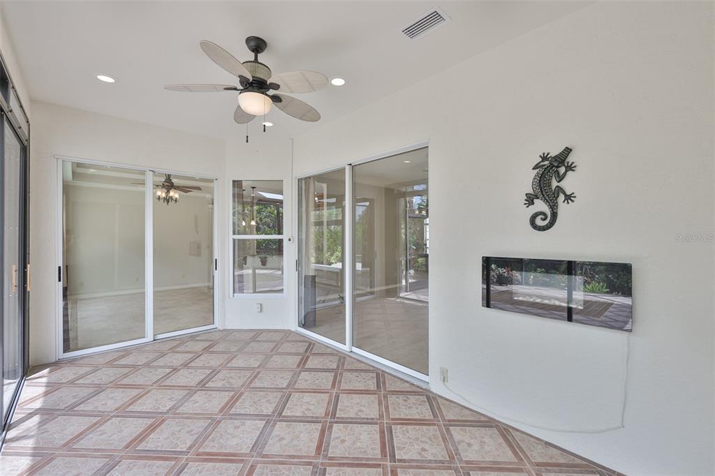 1107 Opal Lane Sun City Center, FL 33573 - Photo 45 of 72 a bedroom with a bed and a window
