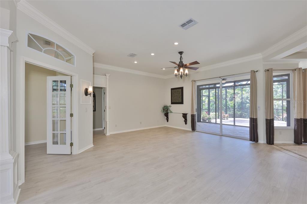 1107 Opal Lane Sun City Center, FL 33573 - Photo 9 of 72 a view of an empty room with a window