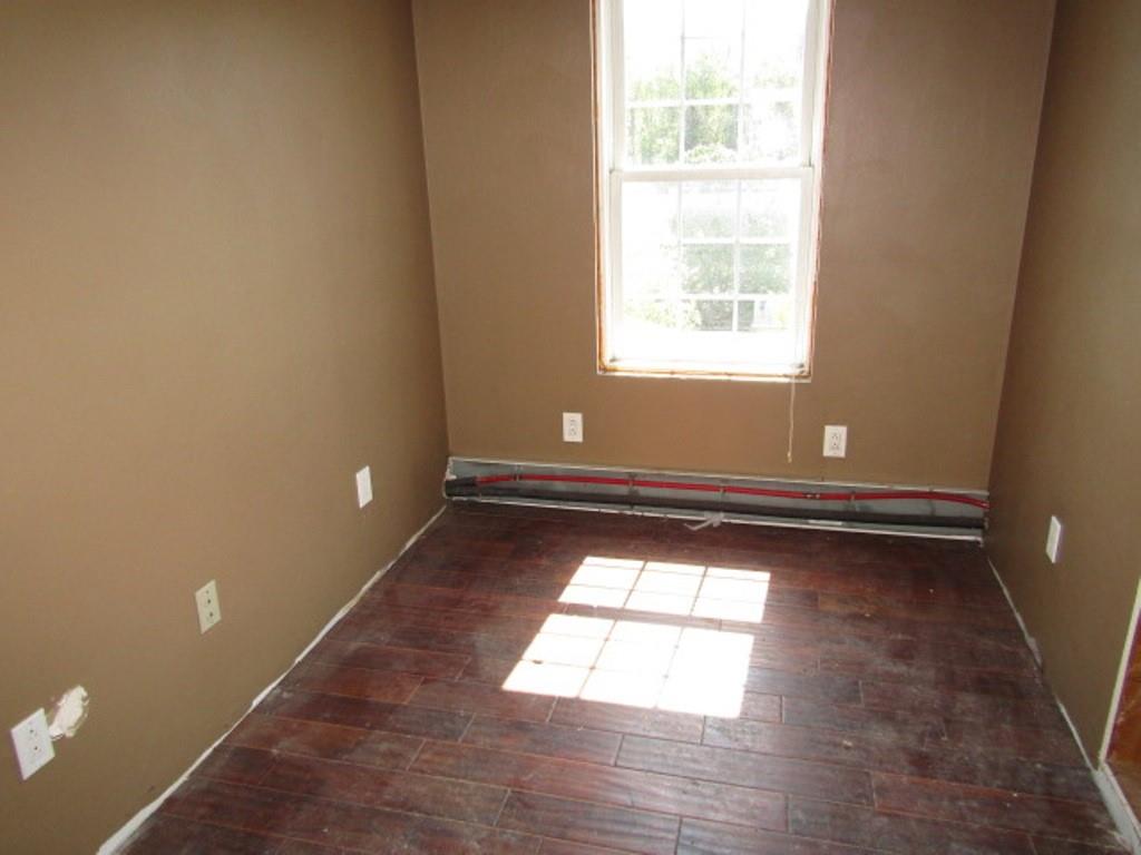 211 Lenkey Road Vanderbilt, PA 15486 - Photo 22 of 38 a view of empty room with wooden floor and fan