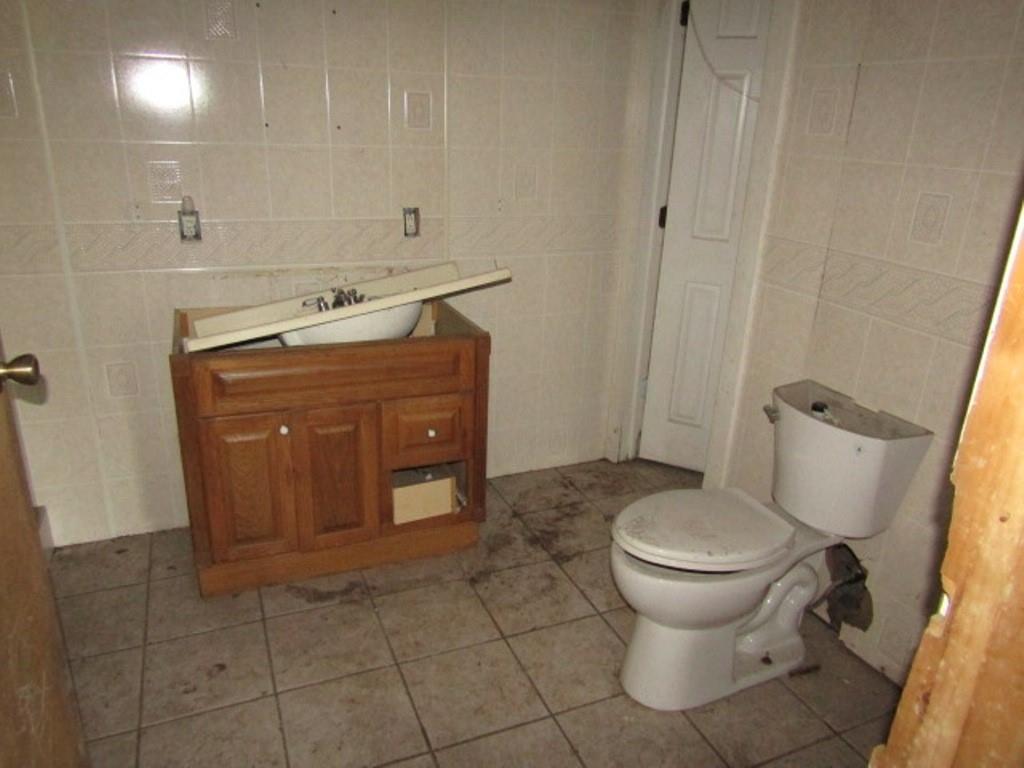 211 Lenkey Road Vanderbilt, PA 15486 - Photo 31 of 38 a bathroom with a sink and a toilet