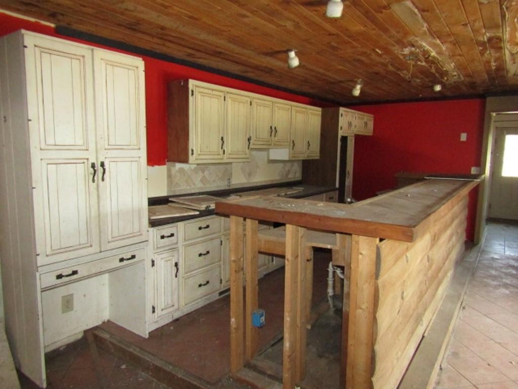 211 Lenkey Road Vanderbilt, PA 15486 - Photo 32 of 38 a bathroom with a granite countertop sink and a mirror