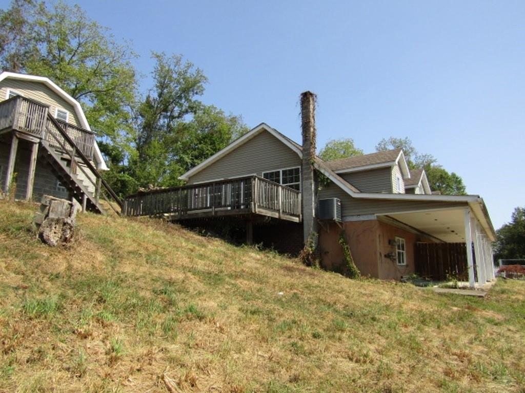 211 Lenkey Road Vanderbilt, PA 15486 - Photo 9 of 38 a front view of a house with a yard