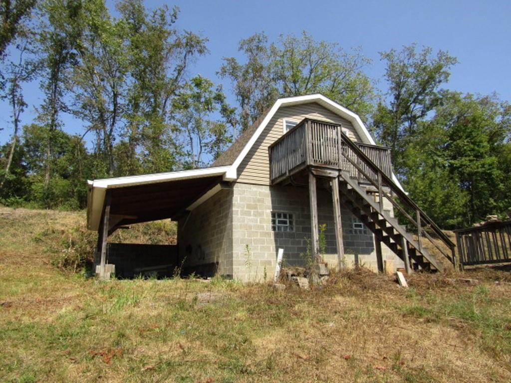211 Lenkey Road Vanderbilt, PA 15486 - Photo 10 of 38 a front view of a house with a yard