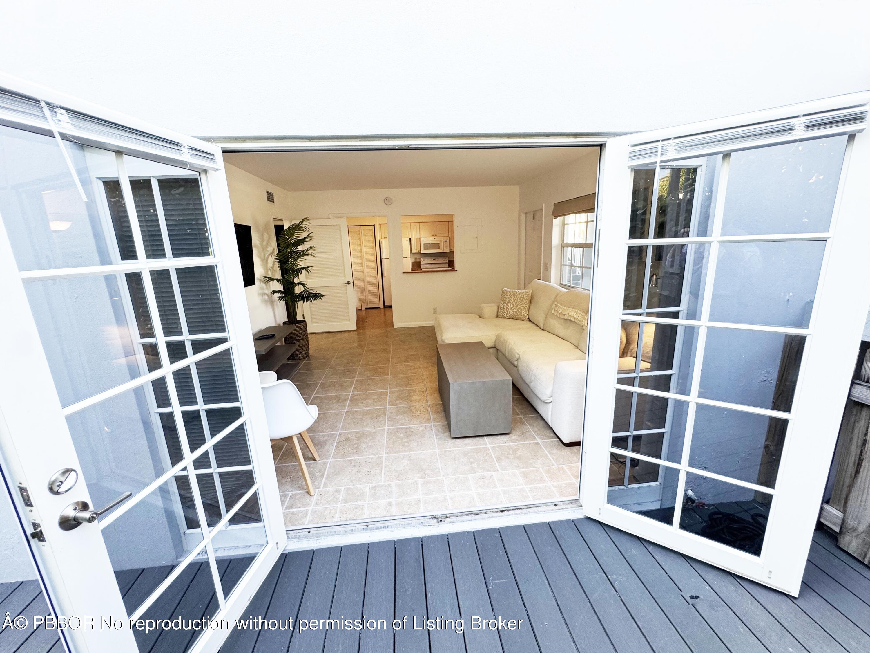 234 Oleander Avenue, Unit 1 Palm Beach, FL 33480 - Photo 2 of 19 Outside into Living Room