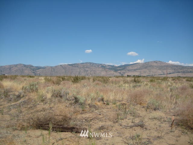 1 Engh Road Omak, WA 98841 - Photo 4 of 9 a view of lake with mountain in background