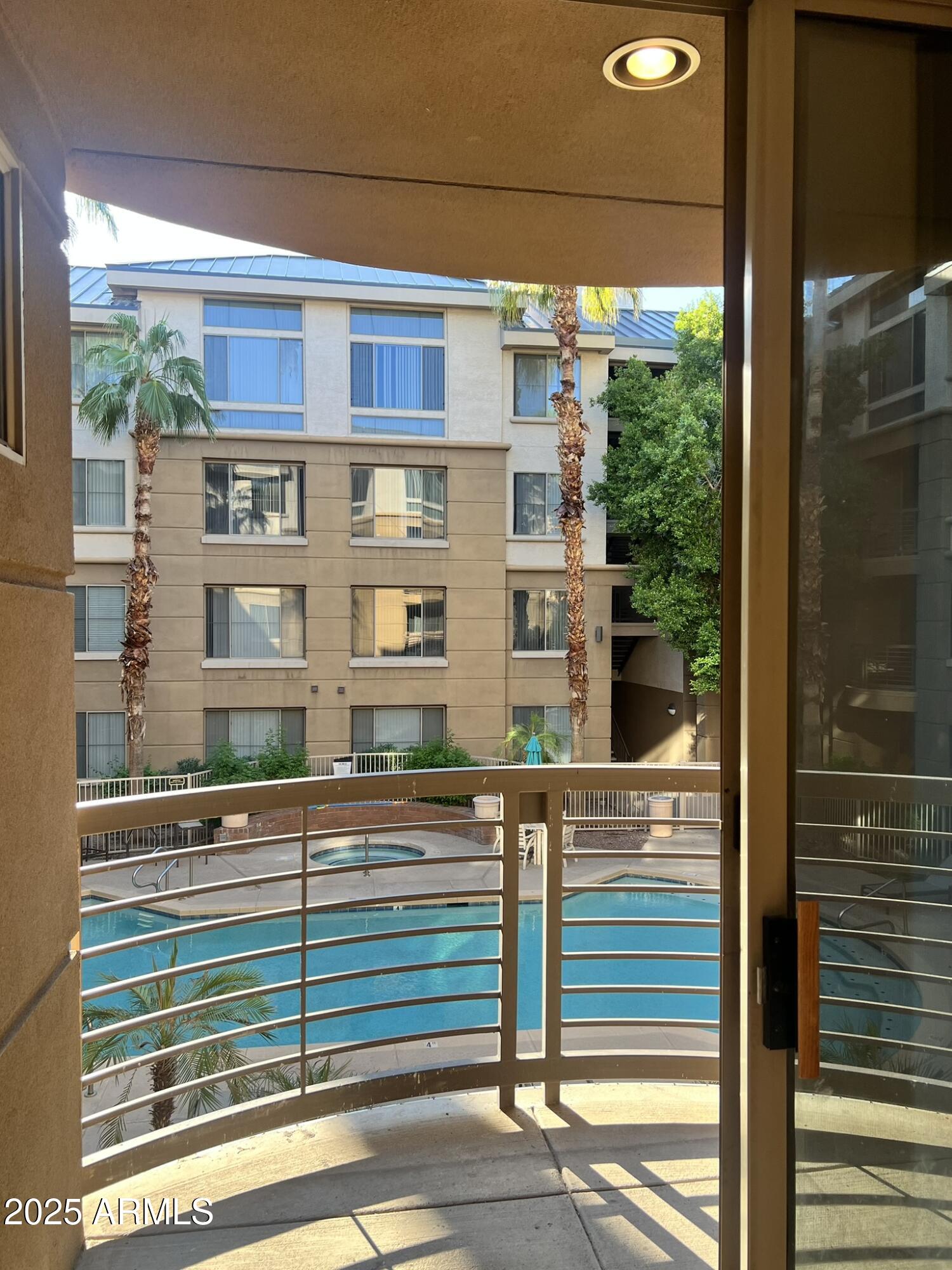 1701 East Colter Street, Unit 253 Phoenix, AZ 85016 - Photo 3 of 17 a view of a building from a window