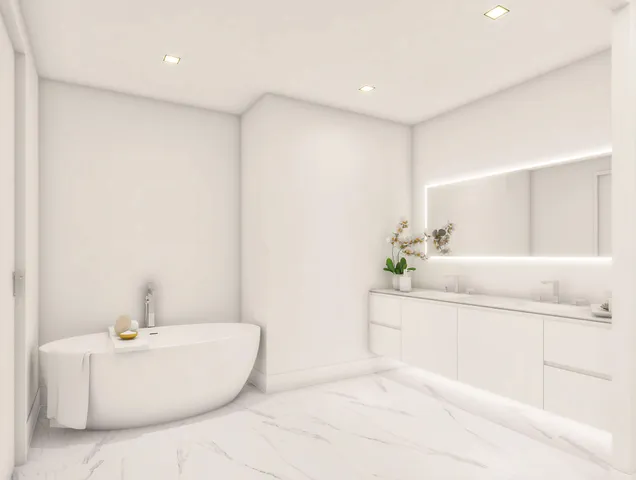 a bathroom with a bathtub and a sink