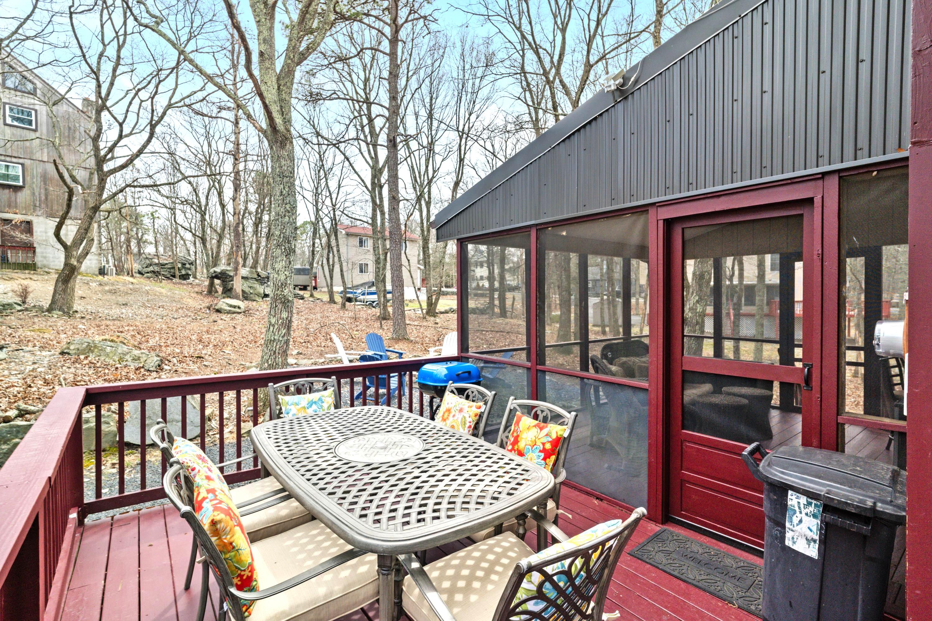 2196 Scarborough Way Bushkill, PA 18324 - Photo 25 of 58 a view of a chairs and table on the deck