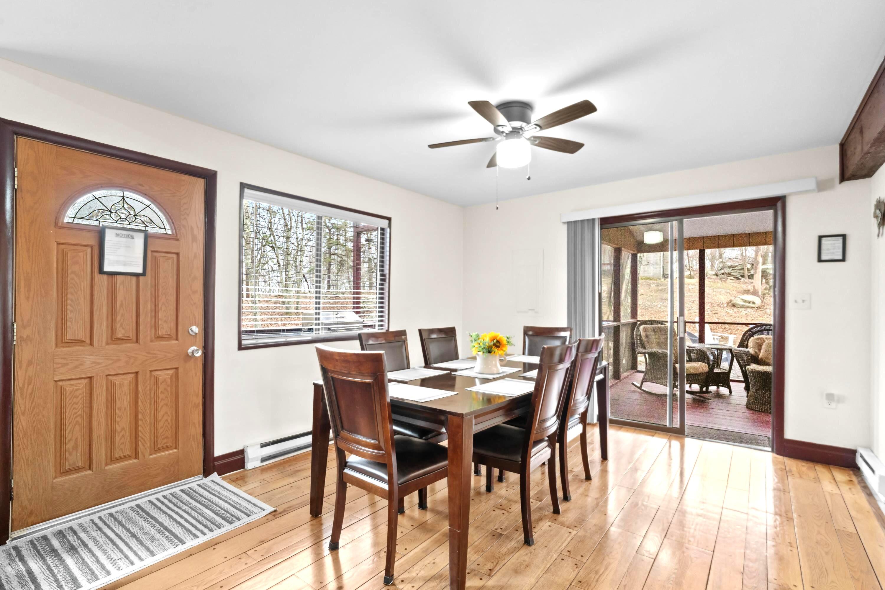 2196 Scarborough Way Bushkill, PA 18324 - Photo 4 of 58 a view of a dining room with furniture window and wooden floor