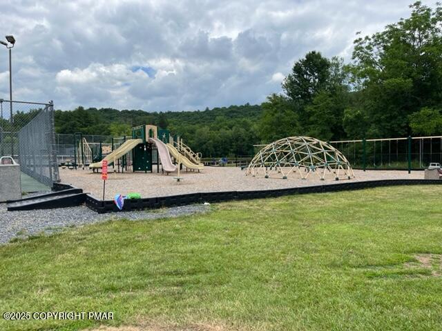 2196 Scarborough Way Bushkill, PA 18324 - Photo 47 of 58 a view of a swimming pool with a yard