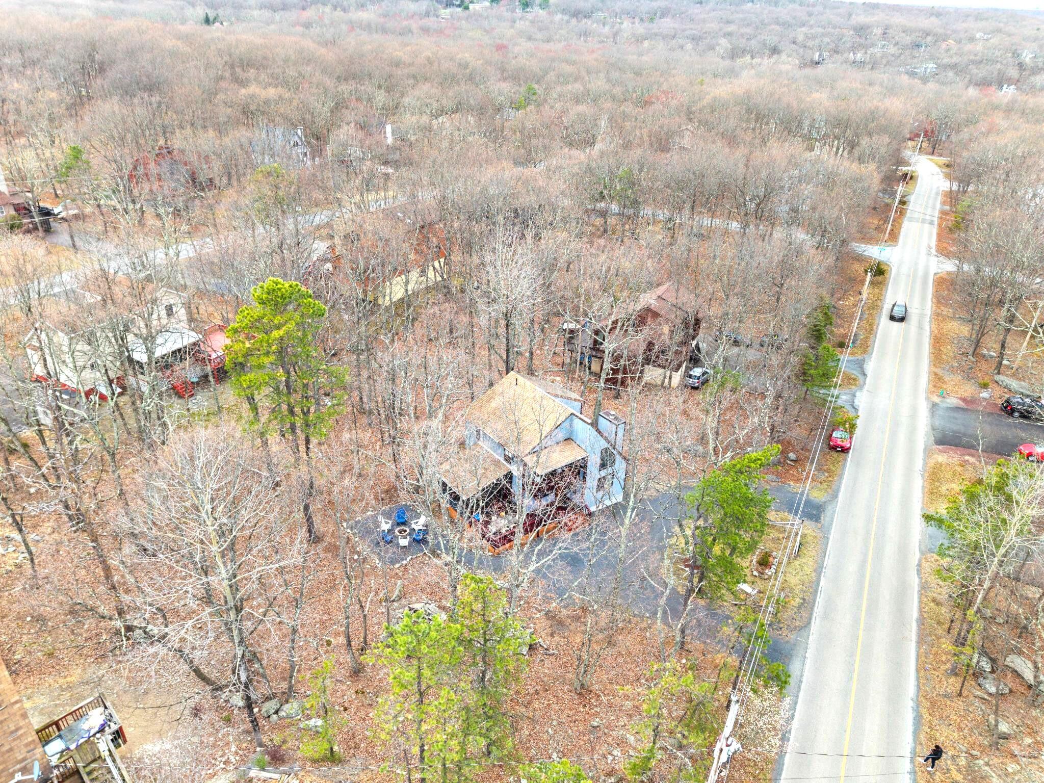 2196 Scarborough Way Bushkill, PA 18324 - Photo 55 of 58 a close up of a vase with flowers