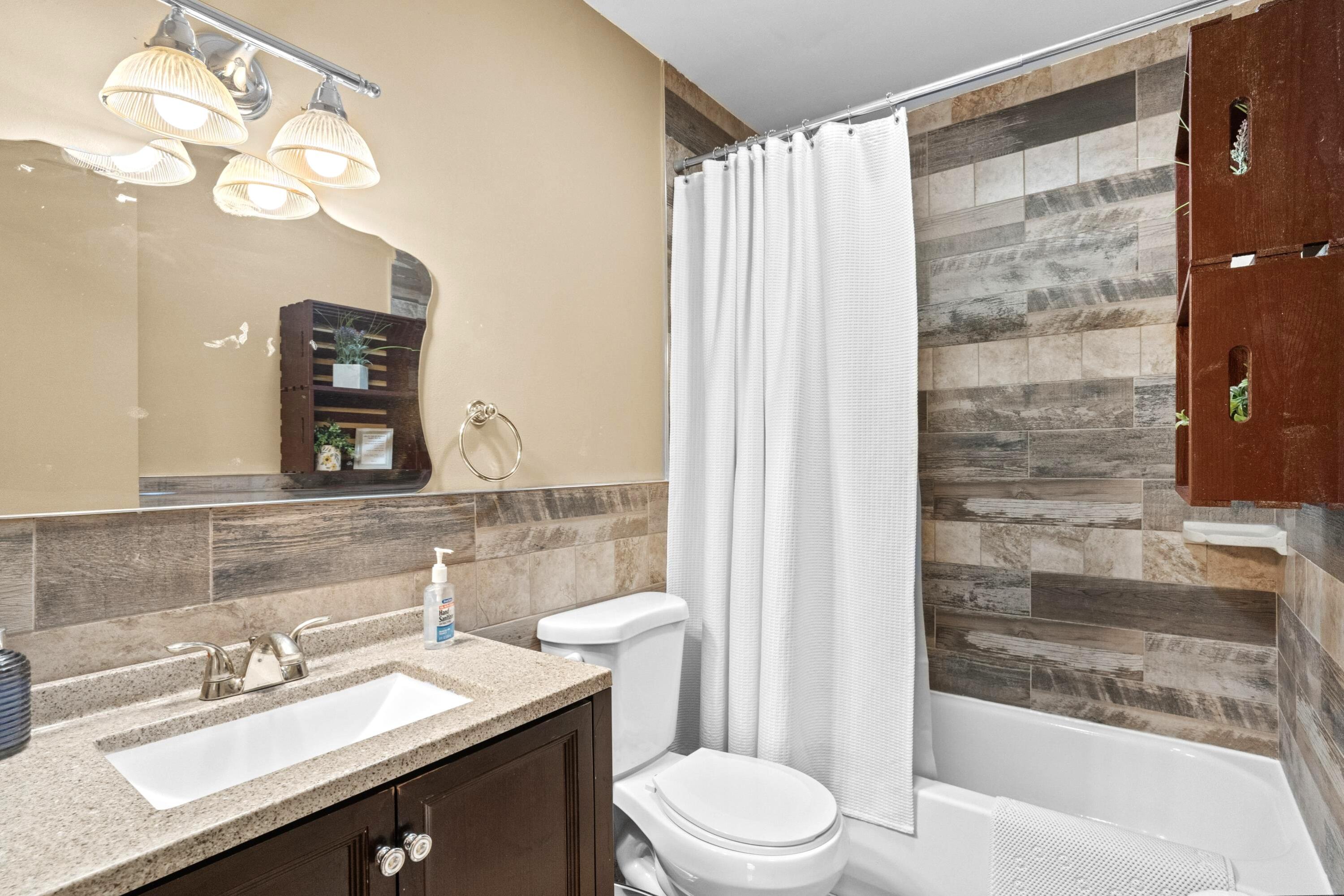 2196 Scarborough Way Bushkill, PA 18324 - Photo 8 of 58 a bathroom with a sink a toilet and shower