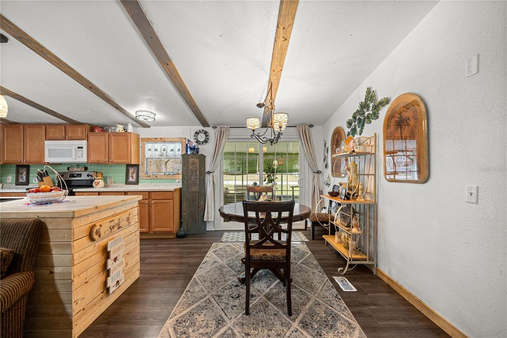 17172 Northeast 37th Terrace Citra, FL 32113 - Photo 15 of 38 a kitchen with stainless steel appliances granite countertop lots of counter top space