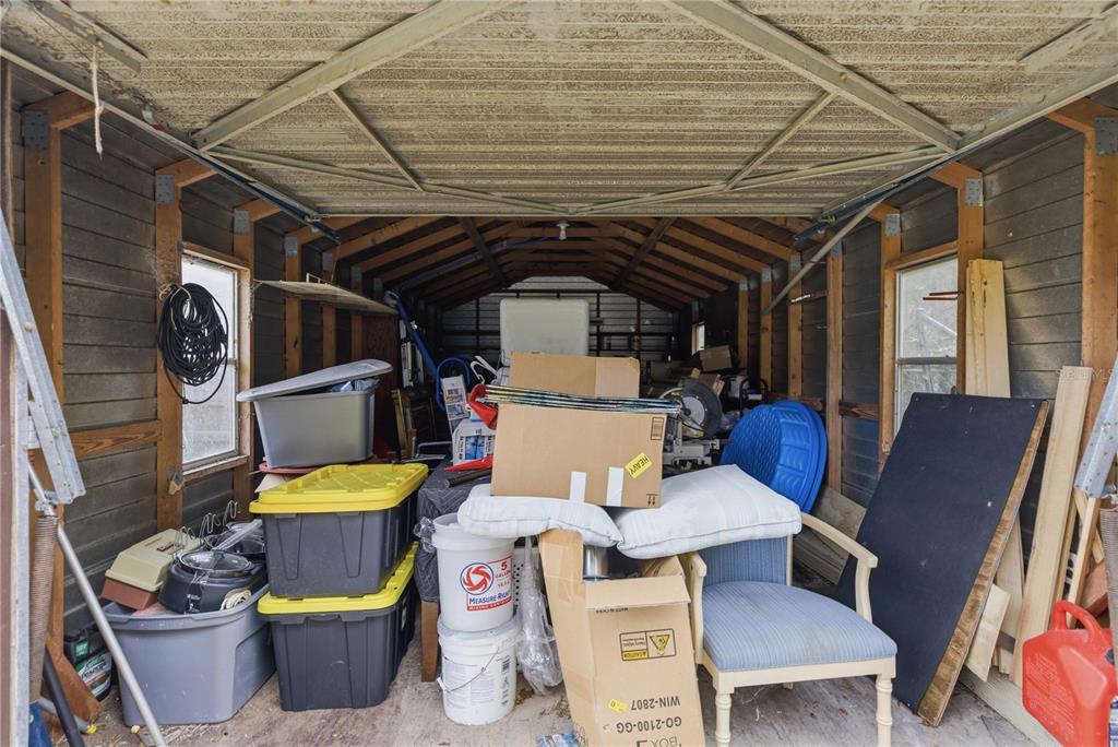 17172 Northeast 37th Terrace Citra, FL 32113 - Photo 30 of 38 a front view of a house with outdoor seating
