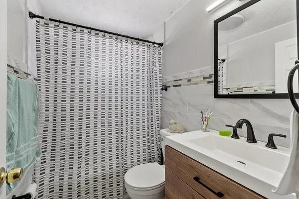 a room with furniture and a window