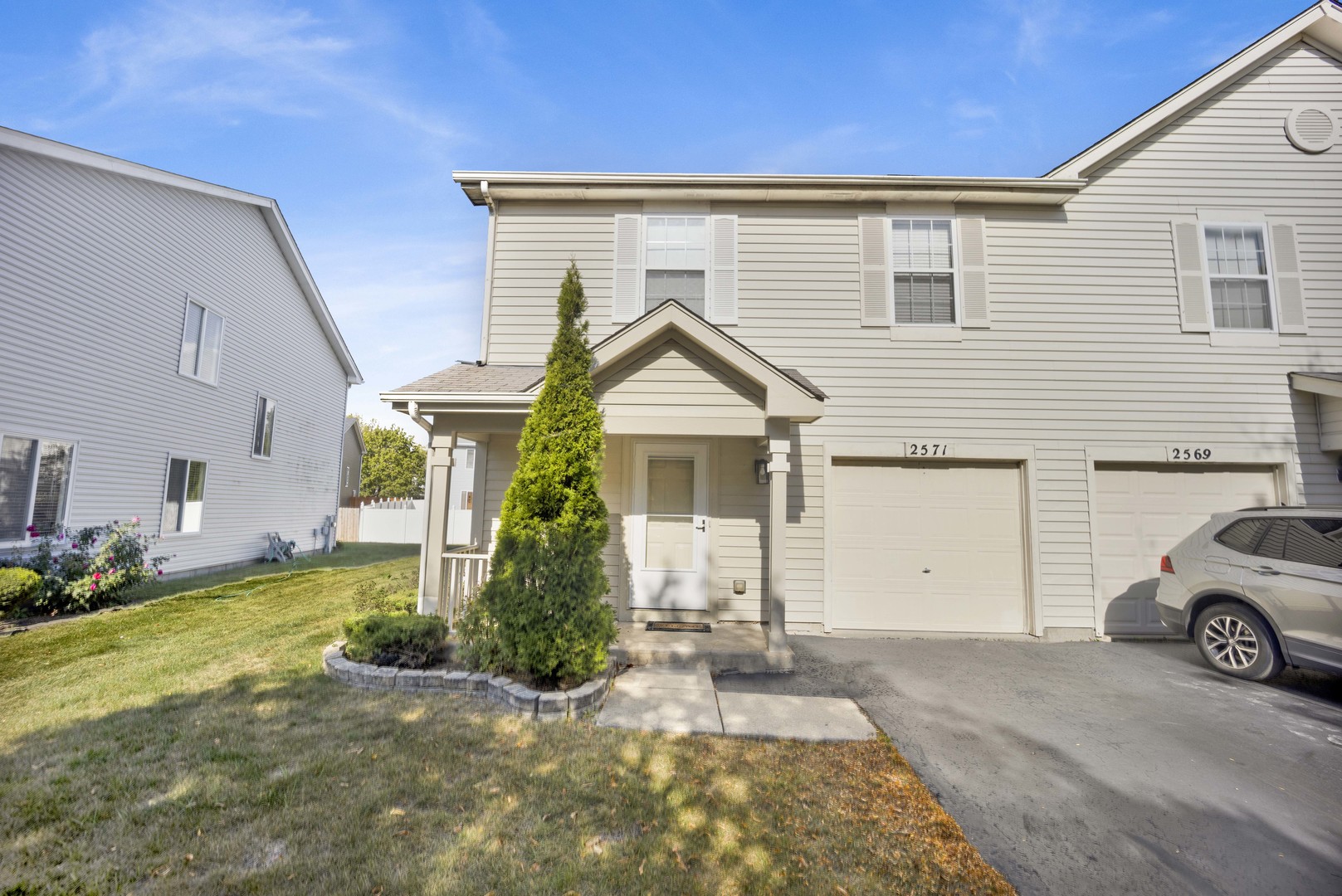 a house view with a garden space