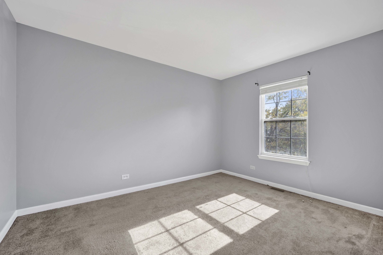 2571 Eldorado Lane, Unit 1 Naperville, IL 60564 - Photo 12 of 21 an empty room with windows