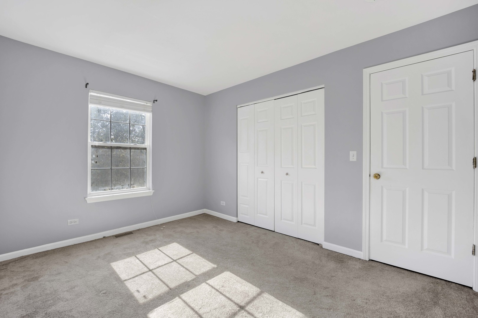 2571 Eldorado Lane, Unit 1 Naperville, IL 60564 - Photo 13 of 21 a view of an empty room with a window