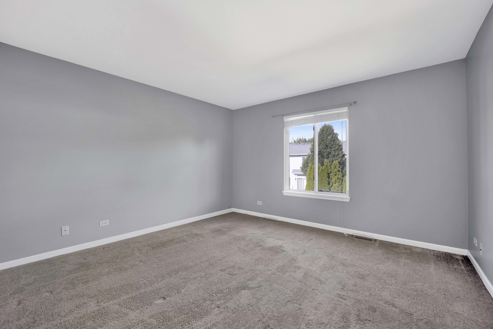 2571 Eldorado Lane, Unit 1 Naperville, IL 60564 - Photo 15 of 21 an empty room with windows