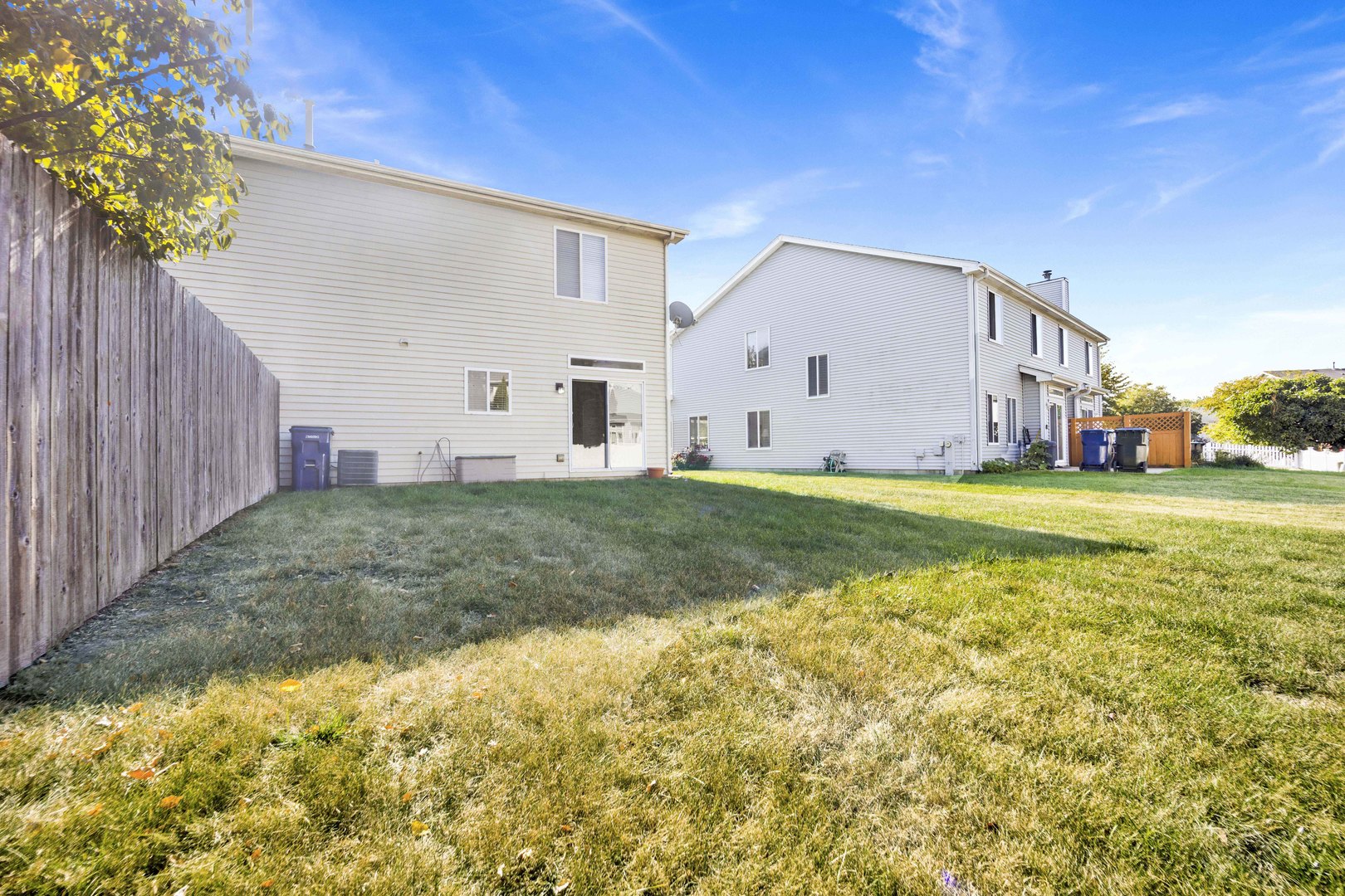 2571 Eldorado Lane, Unit 1 Naperville, IL 60564 - Photo 21 of 21 a view of a house with backyard and garden