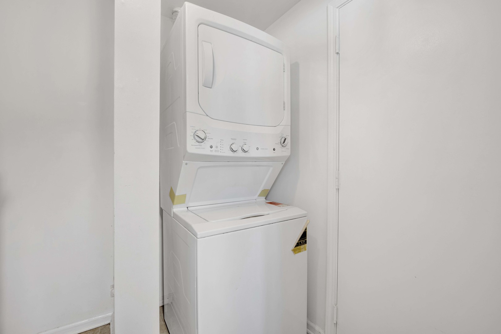 2571 Eldorado Lane, Unit 1 Naperville, IL 60564 - Photo 8 of 21 a utility room with dryer and washer
