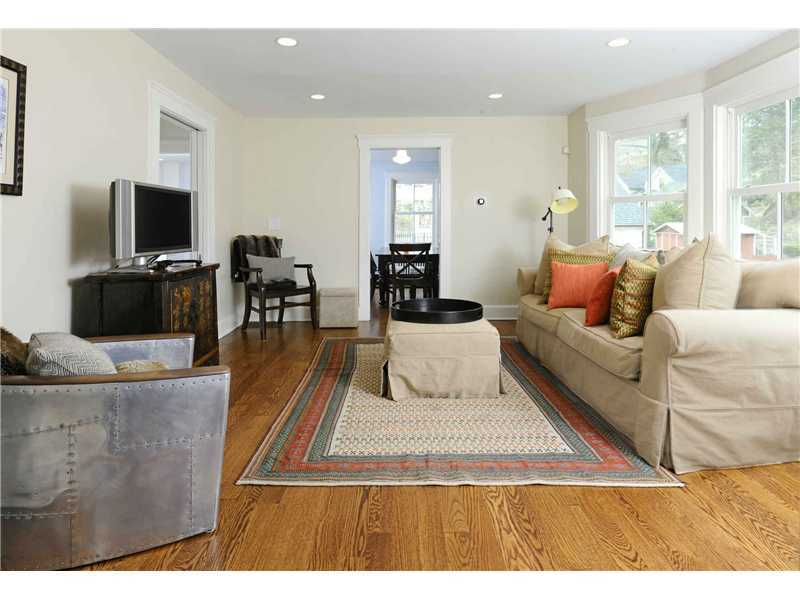 226 Valley Road Cos Cob, CT 06807 - Photo 3 of 17 a living room with furniture and a flat screen tv