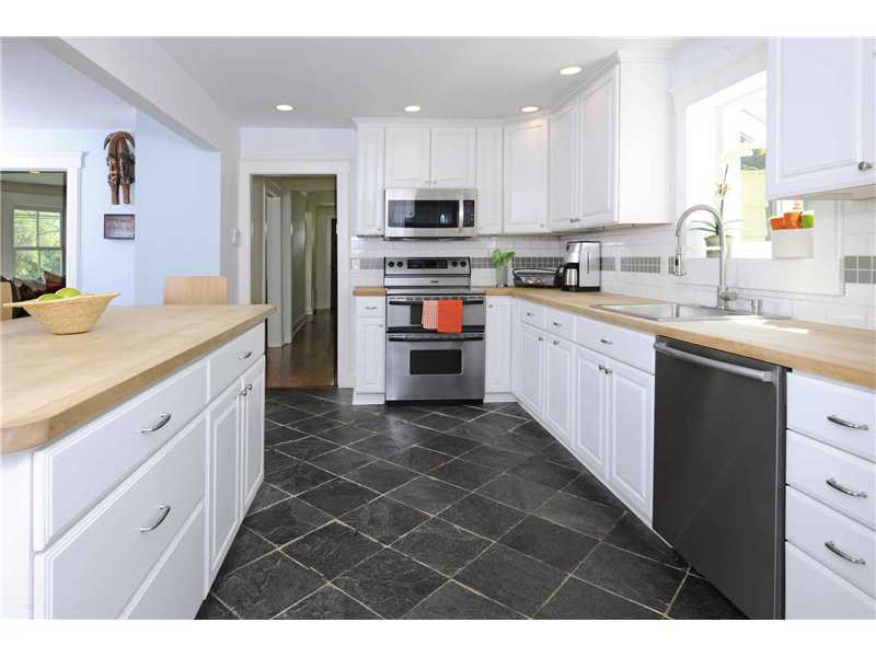226 Valley Road Cos Cob, CT 06807 - Photo 8 of 17 a kitchen with stainless steel appliances granite countertop a sink and cabinets
