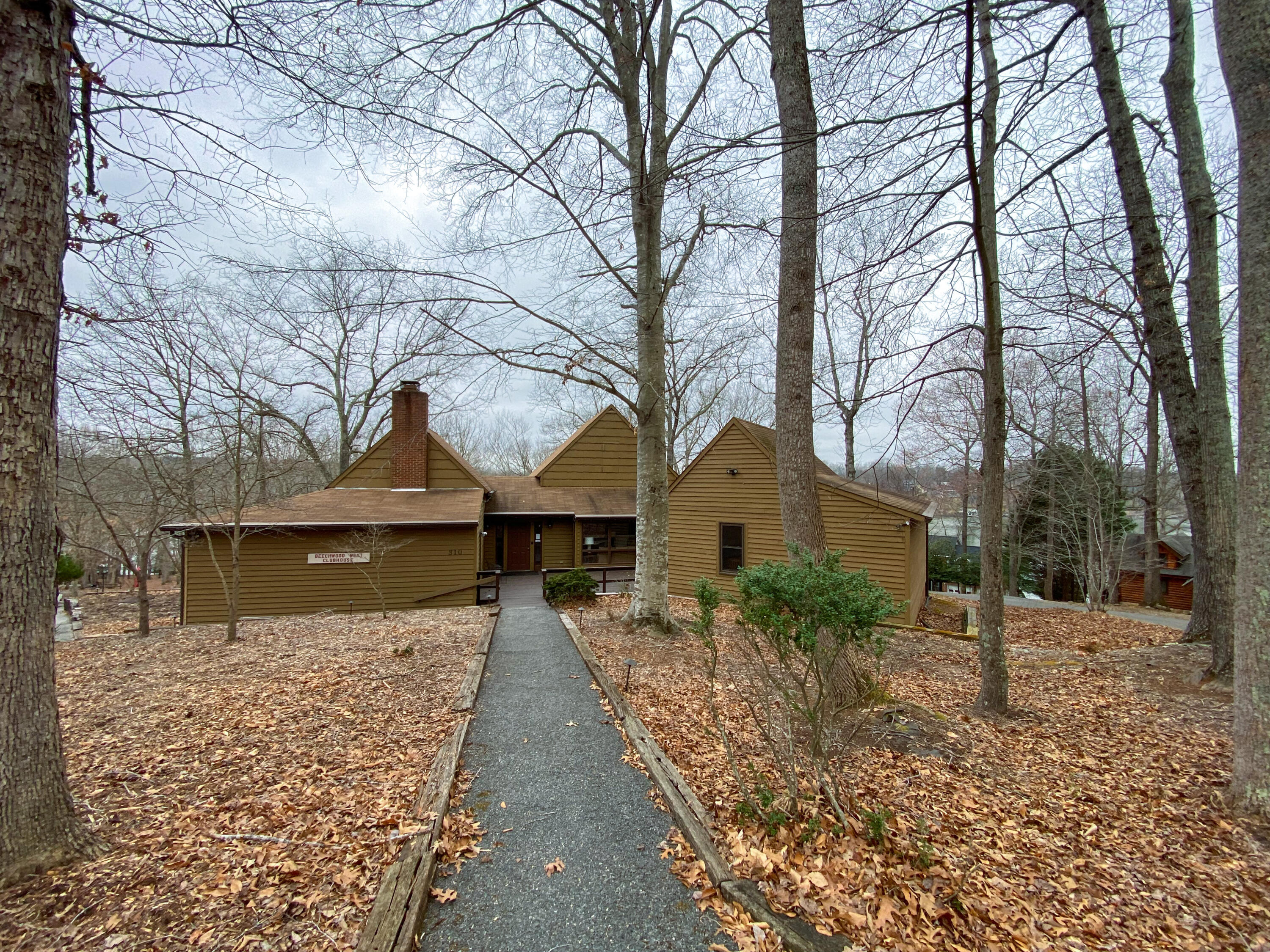 Lot 26 Gap Bridge Road Moneta, VA 24121 - Photo 6 of 20 a front view of a house with a yard covered in snow