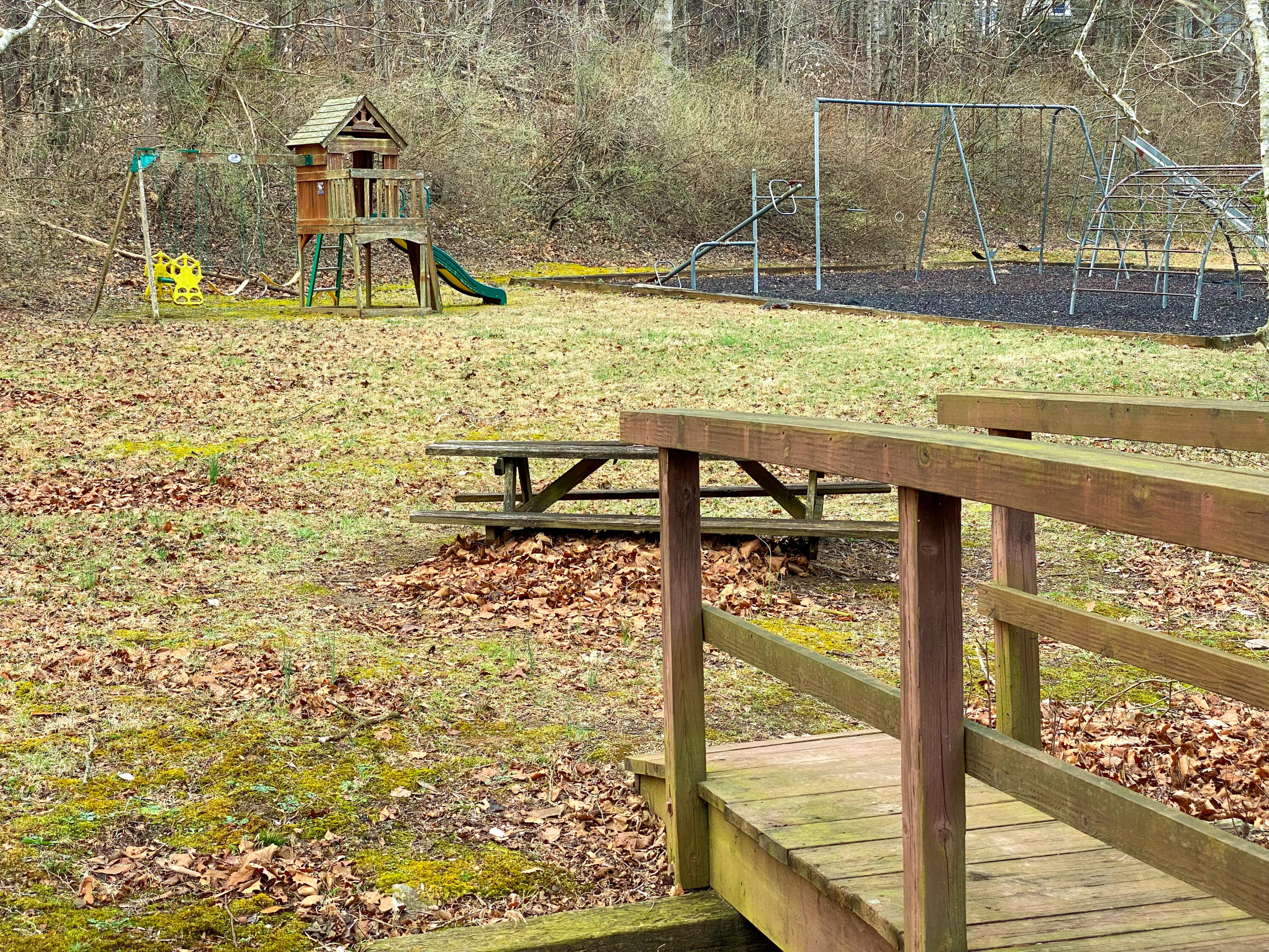 Lot 26 Gap Bridge Road Moneta, VA 24121 - Photo 10 of 20 a view of a porch with a bench and wooden floor