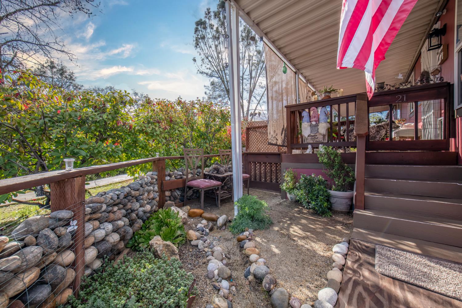33751 Powerhouse Road, Unit 21 Auberry, CA 93602 - Photo 19 of 29 a view of two chairs and table in the balcony