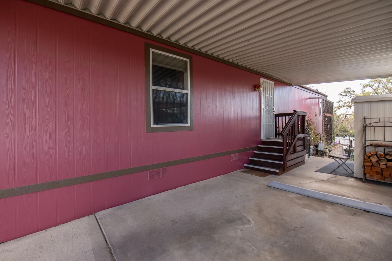 33751 Powerhouse Road, Unit 21 Auberry, CA 93602 - Photo 25 of 29 a view of an empty room with a fireplace