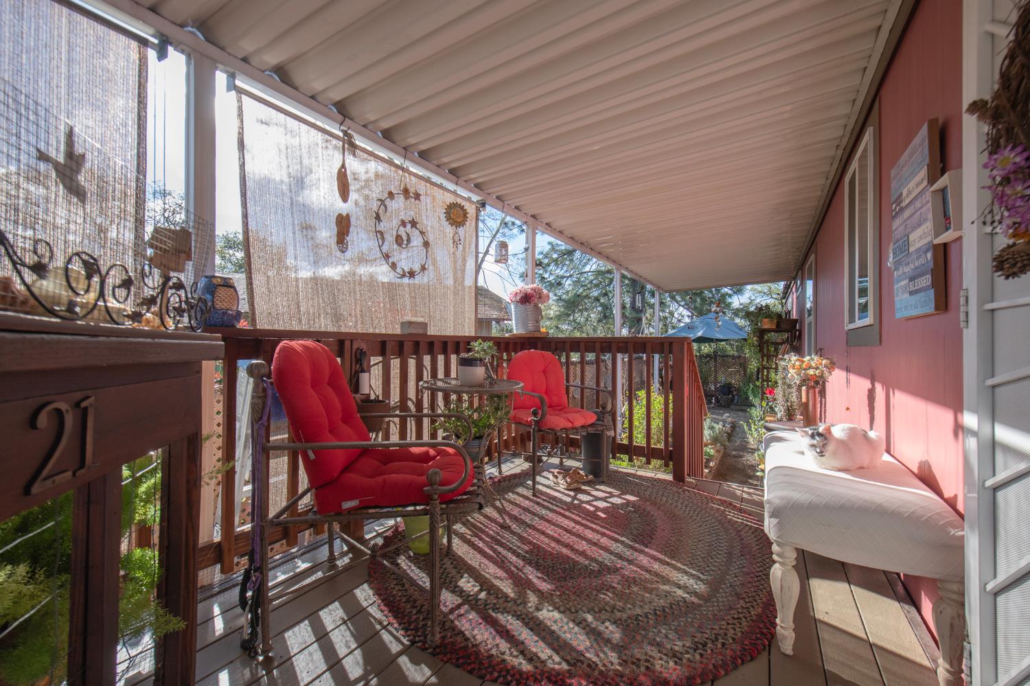 33751 Powerhouse Road, Unit 21 Auberry, CA 93602 - Photo 3 of 29 a view of balcony with wooden floor
