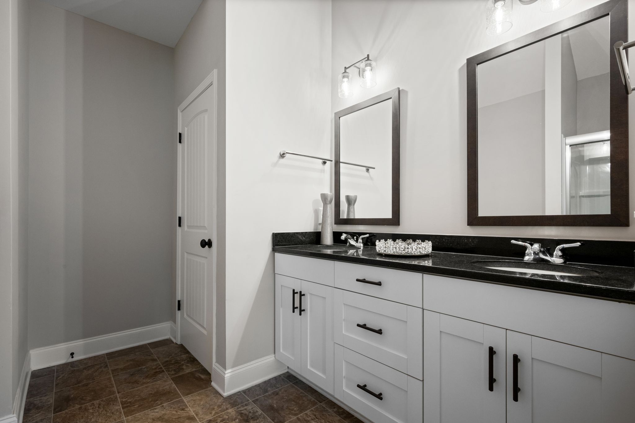 102 Murrell Road Dickson, TN 37055 - Photo 14 of 23 a bathroom with double sink and a mirror